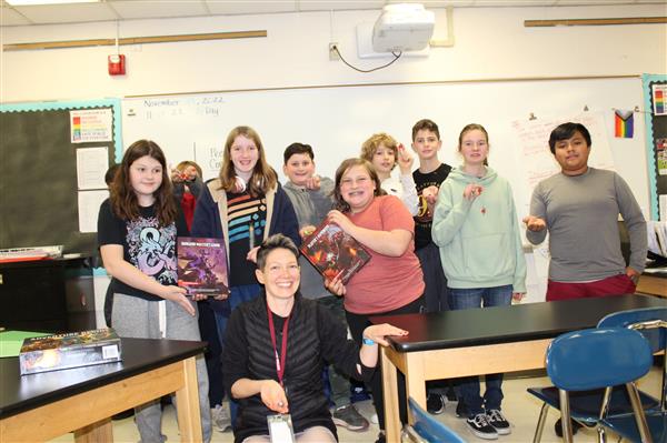  kids in D&D club with props 